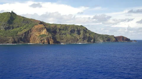 View of Pacific Ocean and mountain covered with greenery in Pitcairn Islands Video stock 51473359