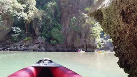 View of paddling through spectacular limestone cliffs Stock Footage 342479829