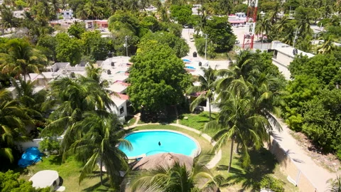 View of palms and pools in yucatan Stock Footage 159384673