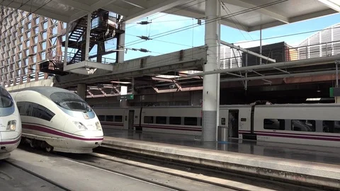 View of pan right Madrid main train station by day modern high speed transport Stock Footage 81977572