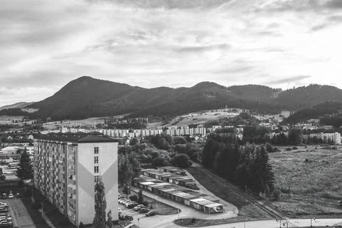 View of the panel buildings and hilly landscape in background. Stock Photos