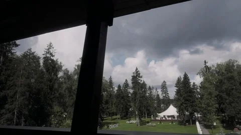 View from the panoramic window to the green park Stock Footage 133865100