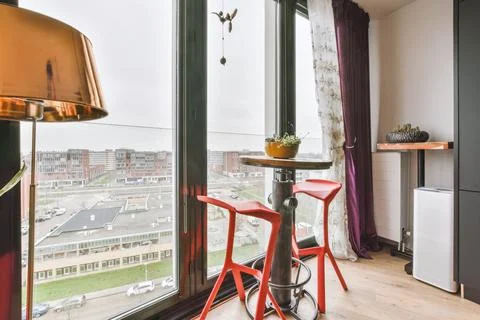View from the panoramic window of a modern apartment Stock Photos
