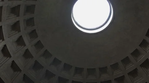 View of pantheon ceiling spinning sun rays coming through the hole Stock Footage 99471415