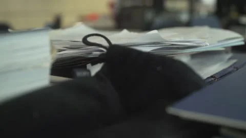 View of papers, books and documents in a messy work office desk Stock Footage 172583736