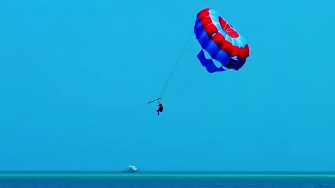 A view to the paragliders during session over Red Sea in Hurghada. Видео 155446958