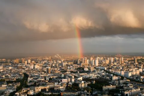View of Paris from above. Rain, clouds, rainbow. Stock Photos