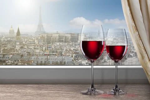 View of Paris and Eiffel tower from window with two glasses of wine View o... Stock Photos
