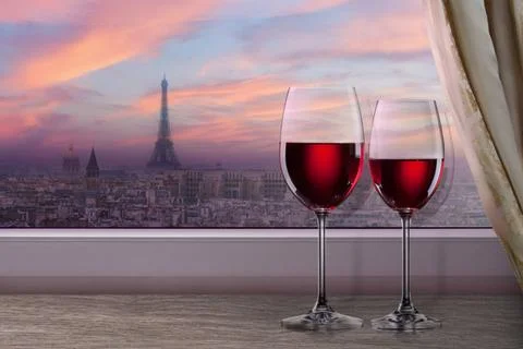  View of Paris and Eiffel tower on sunset from window with two glasses of ... Stock Photos