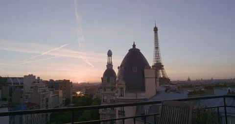 View of paris eiffel tower beautiful sunset over romantic french city on balcony Stock Footage 92707612
