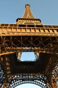 View to the Paris Eiffel Tower complex structure from the ground. Stock Photos