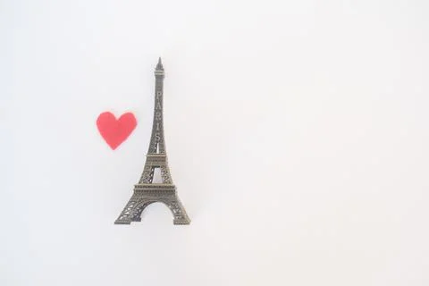 View of paris eiffel tower figurine and heart with copy space Stock Photos