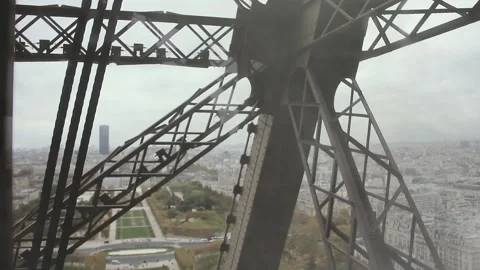 View of Paris from Inside the Elevator of the Eiffel Tower, Paris, France. 스톡 동영상 158860650