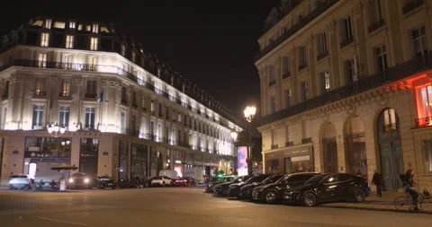 View of the Paris Opera area at night featuring illuminated buildings and Stock Footage 334583692