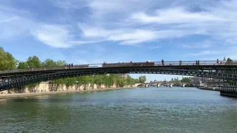 View of Paris from the ship from the River Seine to the numerous bridges of Stock Footage 184812447