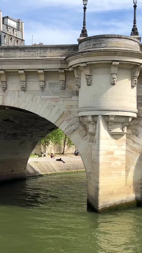 View of Paris from the ship from the River Seine to the numerous bridges of Stock Footage 244251167
