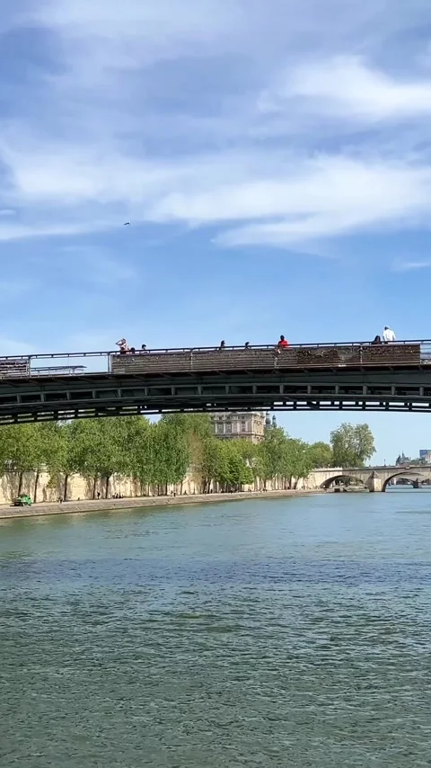View of Paris from the ship from the River Seine to the numerous bridges of Stock Footage 244251276