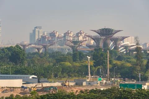 View of a park in the foreground and in the background the city of singapore Stock Photos
