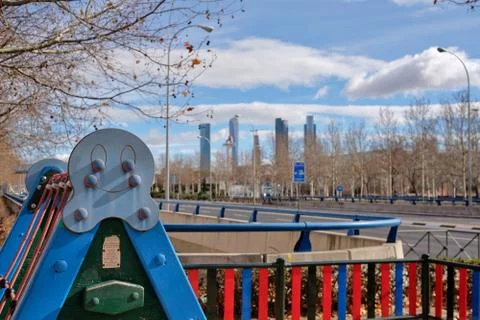 View of a park with the four towers in the background Stock Photos