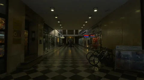 View of parked bikes and shops on a hallway in Zagreb, Croatia Stock Footage 60840016