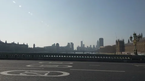 View on Parliament from Empty Westminster bridge in London during Lockdown Stock Footage 127857291