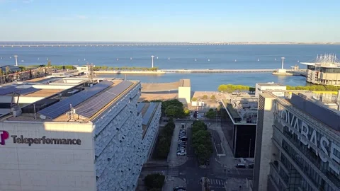 View of the Parque das Nacoes, the Oceanarium, the cable car and the Tagus river Stock-Footage 345133133