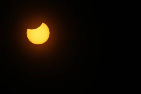 View of a Partial Solar Eclipse, After Third Contact, Sun Seen with Solar ... Stock Photos