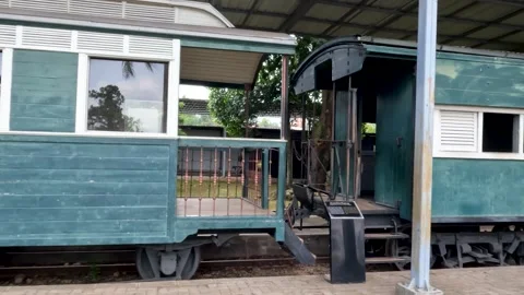 A view of the passenger carriage for an ancient steam train parked on the tra Stock Footage 201427156