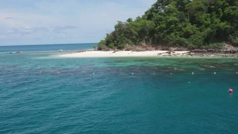 A view from passenger ferry of the blue sea and the island in the middle of the  Stock Footage 157033543