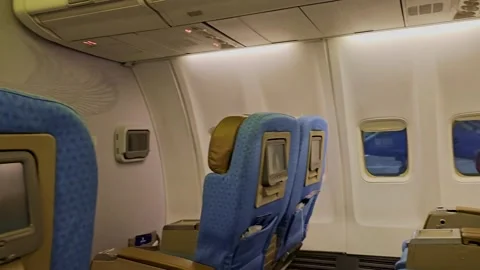 A view of a passenger plane with a blue and white seat Stock Footage 291913764