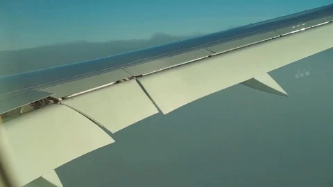 View from the passenger window on the wing of an airplane in a cloud. Video stock 125281481
