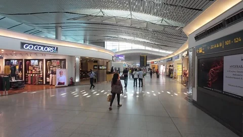 View of passengers inside duty free shopping zone of Airport in Hyderabad. Stock Footage 288314156