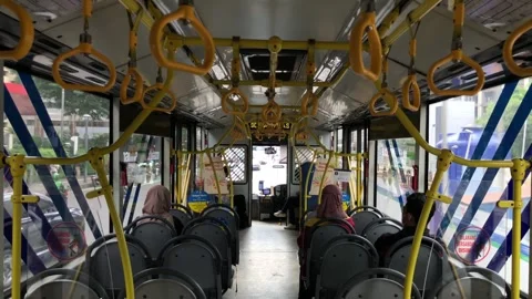 View of passengers inside a moving bus of Trans Jakarta Stock Footage 300550912