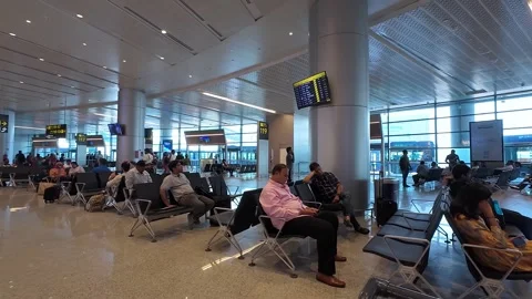 View of passengers inside Rajiv Gandhi International Airport in Hyderabad. Stock Footage 288314802