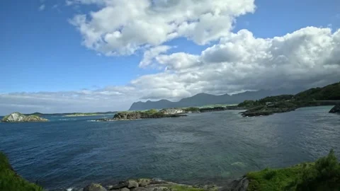 View past 60 kmh speed limit sign and scenic coastal fjord in Senja Norway Stock-Footage 342340399