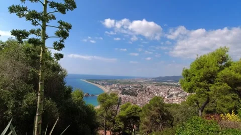 View from the path to Castell de Sant Joan to the city and bay - Blanes Stock Footage 249463845