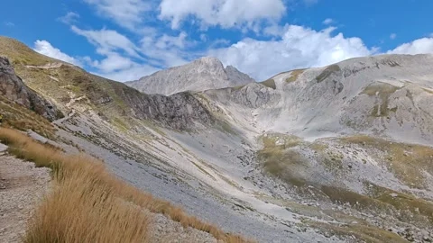 View of the pathway to Corno Grande and Mount Aquila Stock Footage 282515011