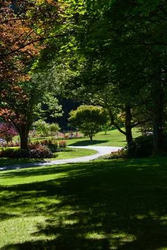 A view of the pathway in the gardens. Stock Photos