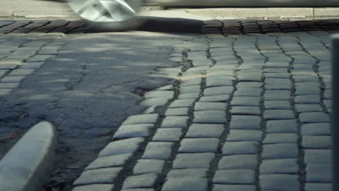 View of the Paved Stone Road On which the Flow of Vehicles passes and the Stock Footage 159460115