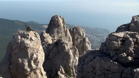 View of peaked trident-shaped rocks on top of mountain Ai Petri. Stock Footage 106775046