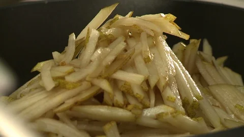 View of pear filling frying process Stock Footage 108615315