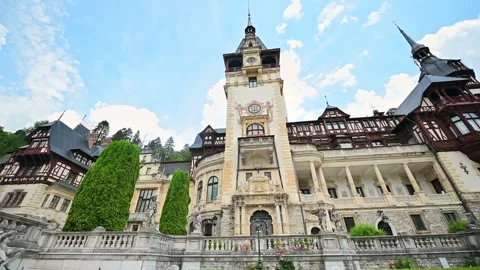 View of The Peles Castle in Romania. Castle with gardens and statues Stock Footage 203906853