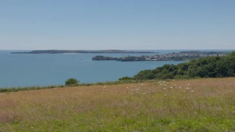 View from the Pembrokeshire Coast Path looking towards Tenby and Caldey island Stock Footage 282188312