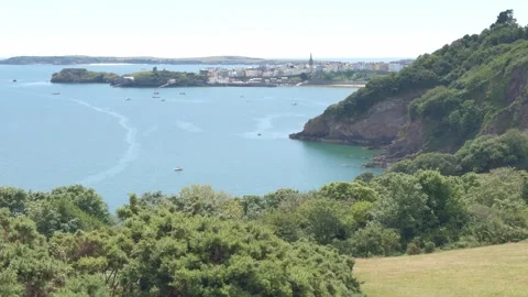 View from the Pembrokeshire Coast Path looking towards Tenby and Caldey island Stock Footage 282188574