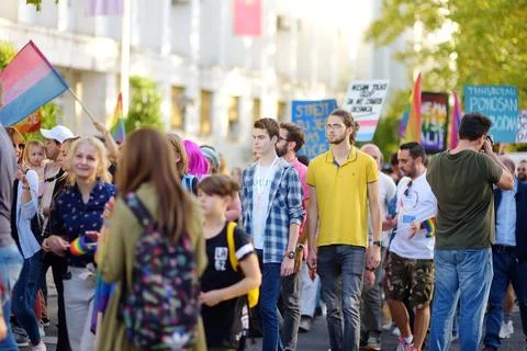 View of people column with rainbow flag Stock Photos