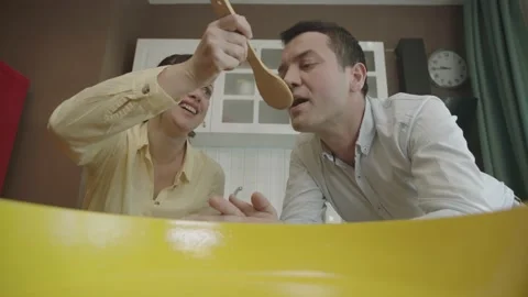 View of people cooking from a pot or pan. Stock Footage 201301086
