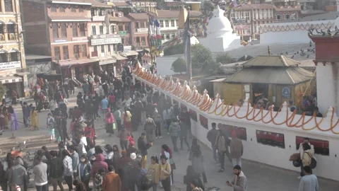 View of people doing the Kora, walking around, Bouddha stupa. Stock Footage 241736105
