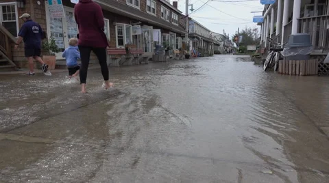 View of people in flooded area Stock Footage 67476304