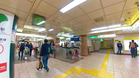 The view of the people passing through the gate in Osaka Japan Stock Footage 129279311