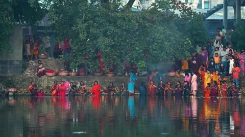 View of people performing a religious ritual in water, Bangladesh. Stock Footage 334987853